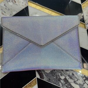 Iridescent clutch with zipper accents